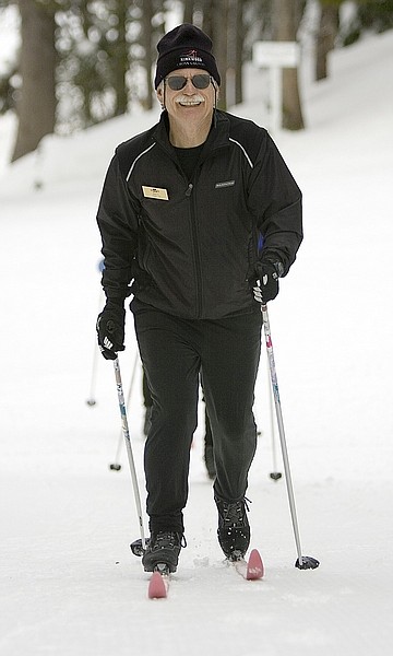 Published Caption: Mike Smith smiles as he skis uphill with ease at Kirkwood Cross Country Ski Center recently.