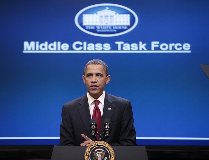 President Barack Obama announces economic initiatives for struggling middle class families, Monday, Jan. 25, 2010, in the Eisenhower Executive Office Building across from the White House in Washington. (AP Photo/Charles Dharapak)