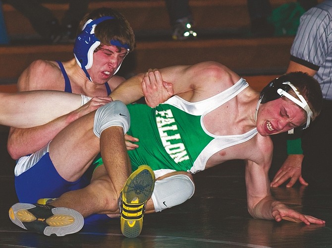 Kim Lamb/Nevada AppealCarson wrester Nick Schlager, left, pinned Chandler Knight 3:59 in the first round Wednesday night in Fallon.