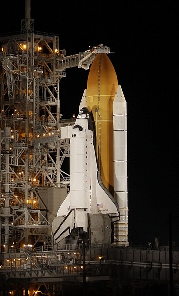 Space Shuttle Endeavour is seen on pad 39A at the Kennedy Space Center, Cape Canaveral, Fla. Sunday Feb.7, 2010. A band of low clouds delayed the launch with 9 minutes left in the countdown. Launch managers said they will try again Monday. (AP Photo/John Raoux)