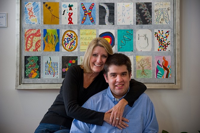 Shawn Helbig, 27, who has Fragile X syndrome, poses with his mother, Sandy Britt, during a visit to Emory University&#039;s Department of Human Genetics, where Helbig is taking part in a clinical trial to find a treatment for the genetic condition, Thursday, Jan. 28, 2010, in Atlanta.    (AP Photo/Rich Addicks)