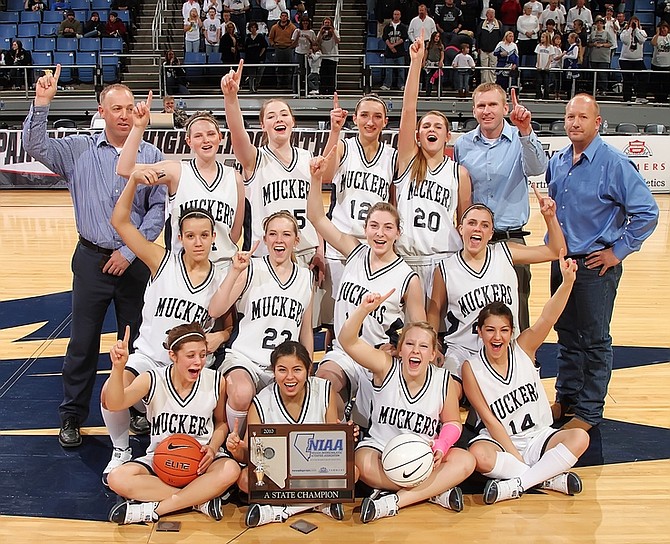 John Byrne/For the Nevada appealMembers of the 1A state champion Virginia City Muckers pose after winning the school&#039;s first title girls basketball title at Lawlor Events Center in Reno on Saturday.