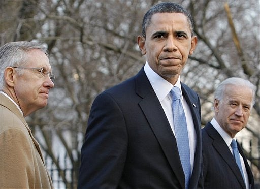 ** RETRNASMISSION TO PPROVIDE ALTERNATE CROP OF DCSA130 ** President Barack Obama, accompanied by Vice President Joe Biden, right, and Senate Majority Leader Harry Reid of Nev., walks back to the White House, from the Blair House in Washington, Thursday, Feb. 25, 2010,  after meeting all day with Republican and Democrat lawmakers to renew his struggle to reform health care. (AP Photo/J. Scott Applewhite)