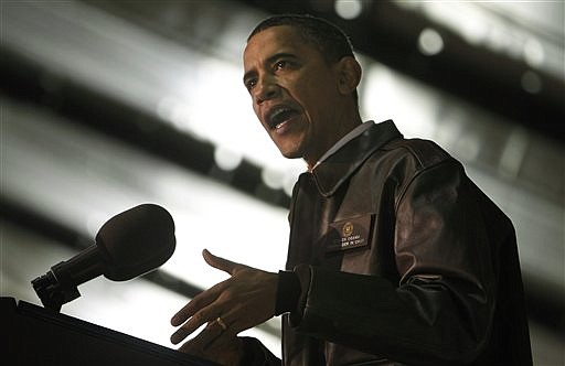 President Barack Obama rallies troops at Bagram Air Base in Afghanistan Sunday, March 28, 2010. (AP Photo/Charles Dharapak)