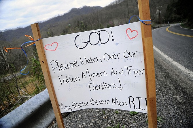 A sign i s posted for motorists along Coal River Road Thursday, April 8, 2010 in Rock Creek, W.Va. On Monday 25 miners were killed in an explosion at nearby Massey Energy&#039;s Upper Big Branch Coal Mine in Montcoal, W.Va. (AP Photo/Jeff Gentner)