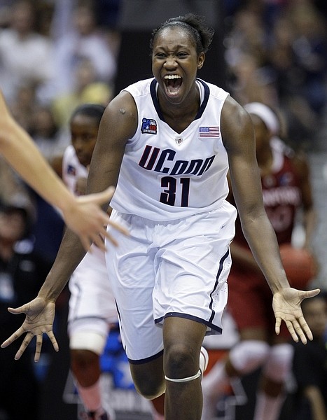 Connecticut&#039;s Tina Charles celebrates in the second half of the women&#039;s NCAA Final Four college basketball championship game against Stanford Tuesday, April 6, 2010, in San Antonio. Connecticut won 53-47. (AP Photo/Eric Gay)