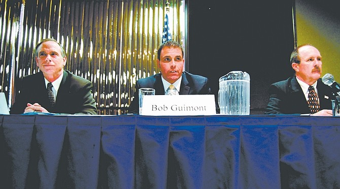 Brian Duggan/Nevada AppealSheriff Kenny Furlong, left, and challengers Bob Guimont, center, and Bob White, right, face off during a forum sponsored by the Carson City Chamber of Commerce in the Carson Nugget Thursday night. About 100 people attended. Candidates for Assembly seats in Districts 38 and 40 also addressed issues.