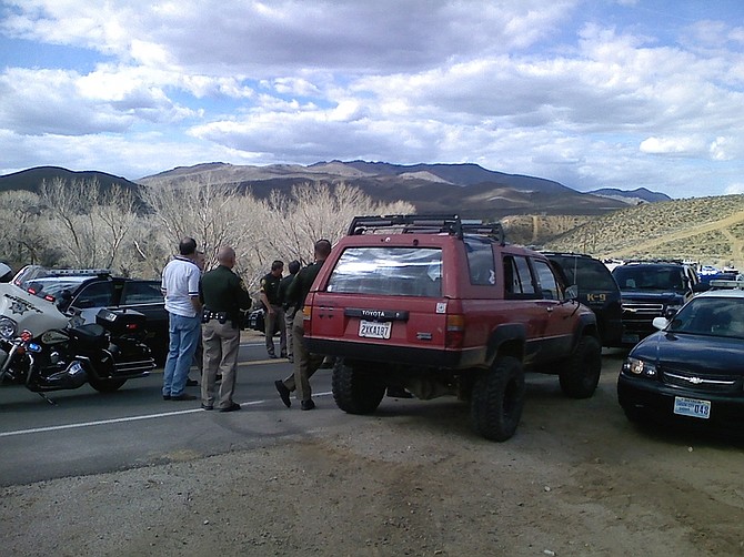 Fran Norton/Nevada AppealCarson City deputies chased a man Tuesday afternoon after he fled police in his red Sports Utility Vehicle.