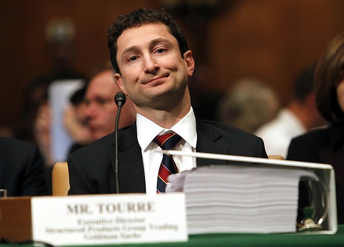 ** RETRANSMISSION FOR IMPROVED TONE QUALITY ** Fabrice Tourre, executive director, Goldman Sachs Structured Products Group Trading, prepares to testify on Capitol Hill in Washington, Tuesday, April 27, 2010, before the Senate Investigations subcommittee. (AP Photo/Charles Dharapak)