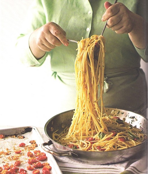 United Feature SyndicateSpaghetti with baked cherry tomatoes recalls the nostalgia of old-school spaghetti.