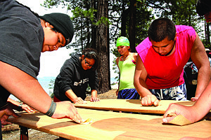 Adam Jensen/Nevada Appeal News ServiceParticipants in the Da&#039;ow paddle camp sand traditional Hawaiian surfboards made of Koa wood at Meeks Bay Resort and Marina on Thursday afternoon.