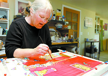 Shannon Litz/Nevada AppealLouise Russell, who signs her work L. Noel, at work in her home studio in Fish Springs, east of Gardnerville.