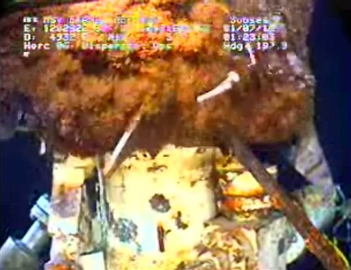 This image from video provided by BP PLC early Thursday, July 1, 2010 shows oil continuing to leak from the broken wellhead, at the site of the Deepwater Horizon oil well in the Gulf of Mexico.   (AP Photo/BP PLC) NO SALES