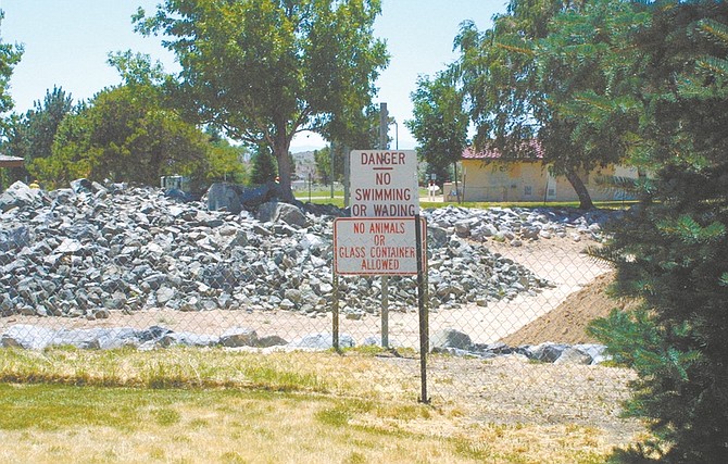Sandi Hoover/Nevada AppealRoss Gold Park remains closed while excavation work is being done to make the pond deeper. Carson City expects to fill the pond for waterfowl and open the popular park to people sometime within the next few weeks.
