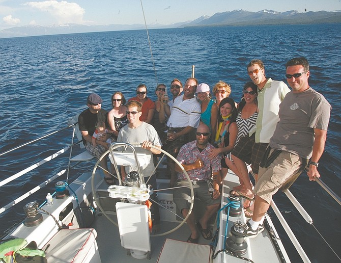 North Lake Tahoe BonanzaPhoto/Matthew RendaA party of Lake Tahoe locals and visitors gather toward the back of the Tahoe Cruz in the midst of a sunset sail on the deep blue waters of the lake during a Sunday evening cruise with Tahoe Sailing Charters.