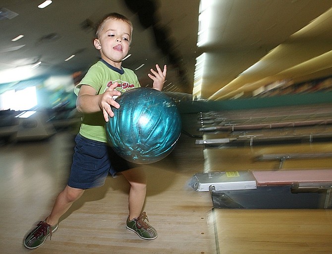 Jim Grant/Nevada AppealKeagan Ferris, 5, enjoys a game of bowling at Carson Lanes.