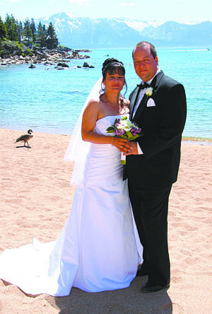 COURTESYLisa Souza and John Ronhovdee were married June 27.