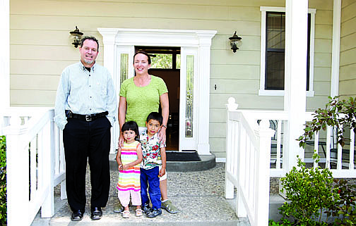 Shannon Litz/Nevada AppealDoug Stewart, director of youth and family ministry for St. Teresa of Avila Catholic Community with Tracy Muscari and Katharine, 3, and Sam, 5, Shonnard, at Mary&#039;s Embrace on Wednesday.