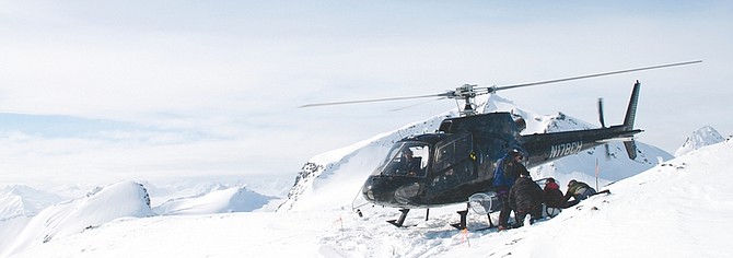 Courtesy of Pacific Crest Heli-GuidesA crew from Alaska Backcountry Adventures, prepares for a first descent near Valdez, Alaska. The company is the older sister to Pacific Crest Heli-Guides, to open in Tahoe and be based out of the Truckee airport Dec. 15 with services extending until April 15.