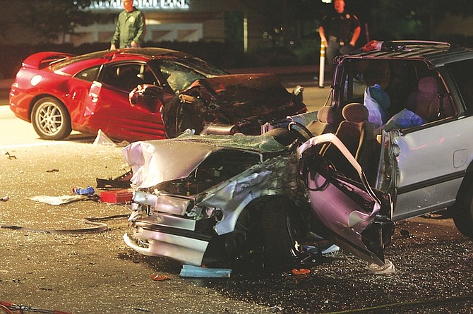 Shannon Litz/Nevada AppealTwo of the vehicles involved in a traffic accident on Highway 395 on Friday night.