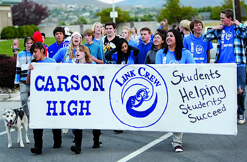 Photos by Shannon Litz/Nevada AppealLink Crew walked in the Carson High School Homecoming Parade on Thursday.