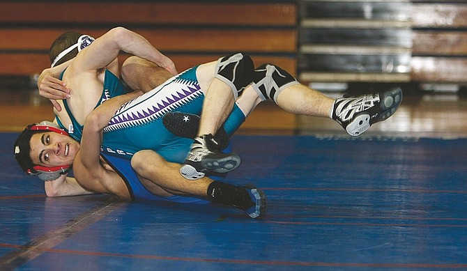 Shannon Litz/Nevada AppealCarson&#039;s Patrick Craugh defeated Spanish Springs&#039; Austin Lee at 112 pounds on Wednesday.