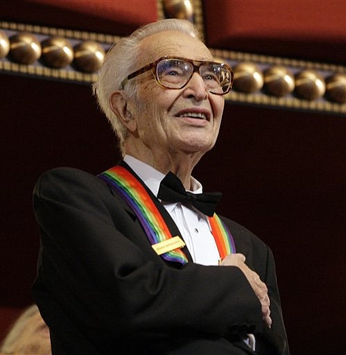 FILE - In this Dec. 6, 2009 file photo, Kennedy Center honoree Dave Brubeck stands for the National Anthem at the Kennedy Center Honors gala in Washington. Brubeck, who turns 90 on Monday, Dec. 6, 2010, will celebrate the day by gathering in the family home in the Connecticut woods to watch Turner Classic Movies broadcast &quot;Dave Brubeck: In His Own Sweet Way,&quot; a new documentary directed by Bruce Ricker, produced by Clint Eastwood and narrated by Alec Baldwin. (AP Photo/Alex Brandon, File)
