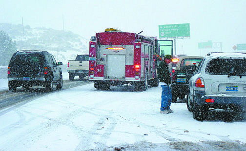 Photos by F.T. Norton/Nevada AppealRelentless snow Friday caused a number of accident on area roadways including three separate accidents, one of which is shown here, on Lakeview Hill on Friday afternoon.