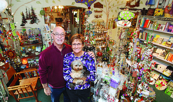Jim Grant/Nevada AppealStan and Sue Jones, with &quot;Bella,&quot; are the owners of the Purple Avocado on North Curry Street.
