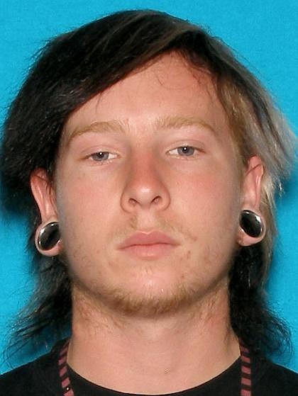 John Linville surrendered this morning following a stabbing and shooting Sunday night.