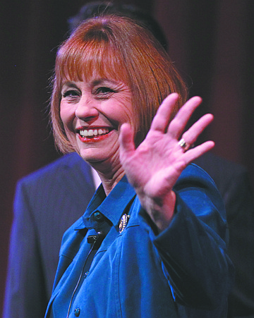 FILE - In this Sept. 23, 2010 file photo, Nevada Republican Senate candidate Senate Sharron Angle acknowledges supporters as she walks on stage for a candidate forum, at Faith Lutheran High School in Las Vegas. (AP Photo/Julie Jacobson, File)