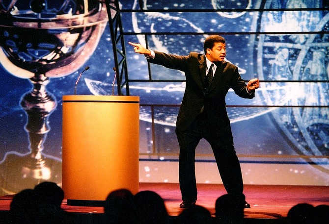 Astrophysicist Neil deGrasse Tyson on stage. Handout photo courtesy of Dr. Tyson.
