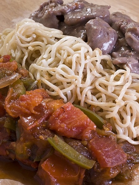 This Jan. 10, 2011 photo shows tomato beef chow mein in Concord, N.H.  The noodles make this a good choice for Chinese New Year when eating long noodles is said to promote long life.   (AP Photo/Larry Crowe)