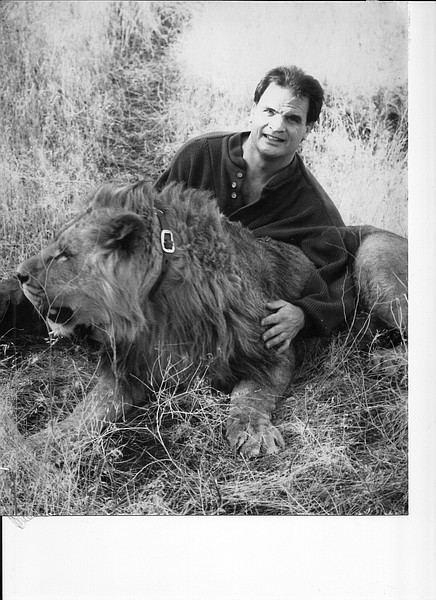 Courtesy photoDale McDaniel cuddles with Claude, the first lion in the Sierra Safari Zoo, which he co-founded. McDaniel, a long time Carson City educator and animal activist, died Jan. 22.