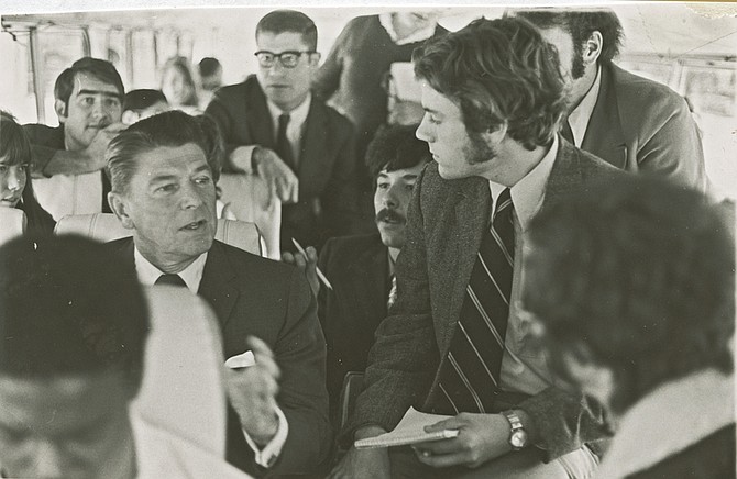Photo by Steve BolingerRonald Reagan speaks with a group of USC journalism students on his campaign bus during his bid for re-election to the California governorship in 1970. Two rows behind Reagan is David C. Henley (wearing glasses), the students&#039; professor. Left of Henley is student Jim Spoo, who years later was elected mayor of Sparks and today is a Sparks municipal judge.