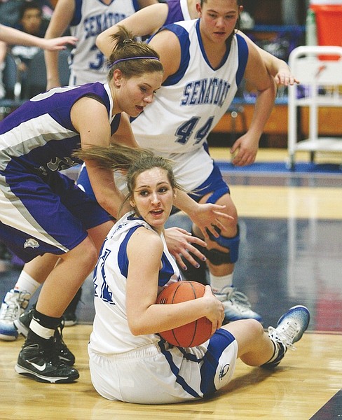 Jim Grant/Nevada AppealCarson&#039;s Jazmyn Stokes grabs a loose ball off the floor in a game against Spanish Springs on Tuesday night.