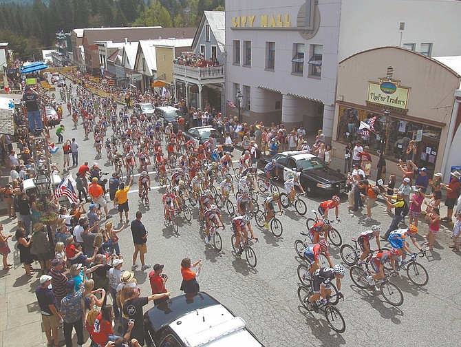 Riders head through Nevada City, Calif., at the start of the eight-day Tour of California cycling race Sunday, May 16, 2010. (AP Photo/Marcio Jose Sanchez)