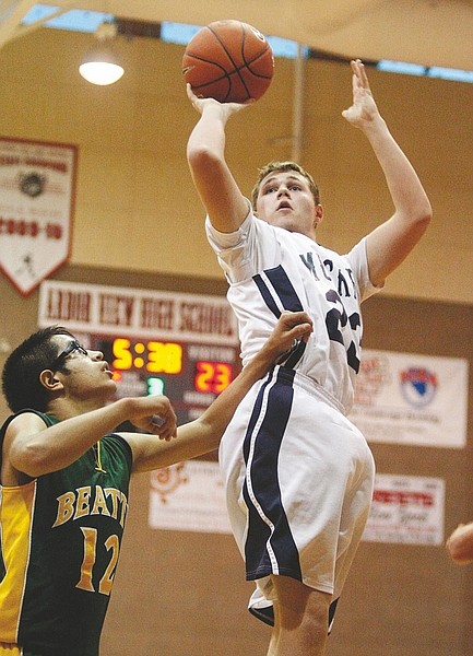 Shannon Litz/Nevada AppealVirginia City&#039;s Justin Avignone shoots against the Beatty Hornets on Friday at Arbor View High School in Las Vegas. The Muckers won 59-44.