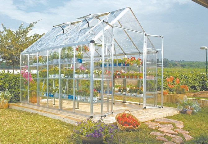 A Snap &amp; Grow greenhouse by Poly-Tex. Greenhouses can afford year-round gardening pleasure for those stuck in cold-weather climates. Illustrates GARDENING (category l), by Adrian Higgins (c) 2010, The Washington Post. Moved Monday, Feb. 1, 2010. (MUST CREDIT: Poly-Tex.)