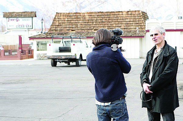 Shannon Litz/Nevada AppealJohn Romano interviews Michael Polsky, the father of &quot;The Motel Life&quot; directors Alan and Gabe Polsky, in front of the Holiday Lodge in Minden where the move was being filmed Friday.