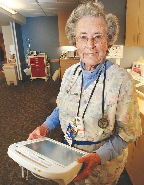 Jim Grant/Nevada AppealNurse Peggy Morris makes her rounds recently at  Carson Tahoe Regional Healthcare.