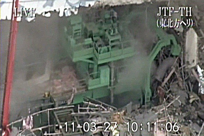 This image released by Japan Ground Self-Defense Force via Kyodo News shows the inside of Unit 4 at the stricken Fukushima Dai-ichi nuclear power plant in Okumamachi, Fukushima Prefecture, northeastern Japan, Sunday, March 27, 2011. (AP Photo/Japan Ground Self-Defense Force via Kyodo News) JAPAN OUT, MANDATORY CREDIT, NO LICENSING IN CHINA, HONG KONG, JAPAN, SOUTH KOREA AND FRANCE