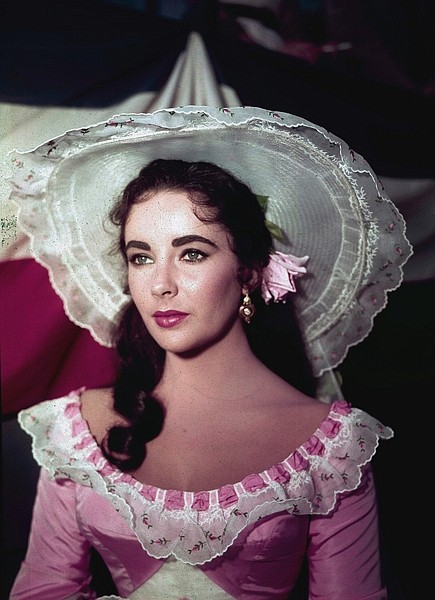 FILE - In this 1957 file photo, actress Elizabeth Taylor is shown in costume for her character in the film &quot;Raintree County.&quot; Publicist Sally Morrison says the actress died Wednesday, March 23, 2011 in Los Angeles of congestive heart failure at age 79. (AP Photo/File)