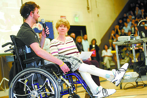 Shannon Litz/Nevada AppealKyle Churchley and his mother, Sally, talk to Carson Middle School students Thursday.