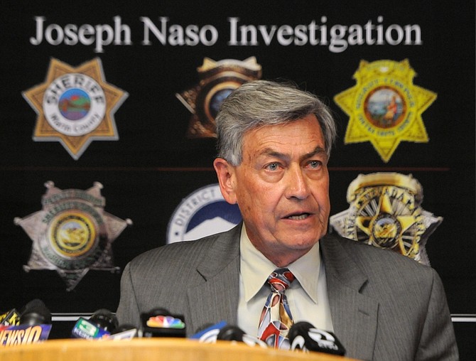 Marin County District Attorney Ed Berberian, at podium, gives a statement during a news conference on Tuesday, April 12, 2011 in San Rafael, Calif., regarding the arrest of Joseph Naso of Reno, Nev. Naso, 77, is accused of murdering four women whose bodies were found across Northern California over two decades. (AP Photo/Independent Journal, Alan Dep) **NO SALES MAGS OUT NO TV NO INTERNET MANDATORY CREDIT**