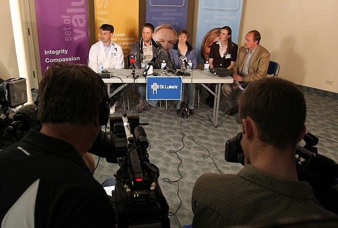 Ray Chretien, second from left, with his wife, Jennifer, and members of St. Luke&#039;s field questions during a news conference Sunday May 8, 2011 at St. Luke&#039;s Magic Valley Medical Center in Twin Falls, Idaho. The news conference was related to Rita Eleanor Chretien, who was missing for seven weeks and found Friday, and Albert Chretien, who is still missing. (AP Photo/Times-News, Ashley Smith)