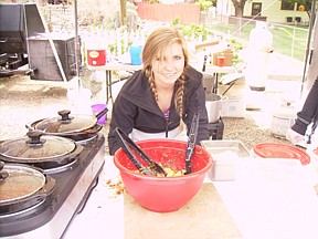 Sandi Hoover/Nevada AppealMia Cavilia of 1st &amp; 10 Bar &amp; Grill, serves roasted tomato/basil pasta with parmesan during the Oodles of Noodles festival Saturday in Dayton. They won Judge&#039;s Choice Award and 2nd Place in the Professional Category.
