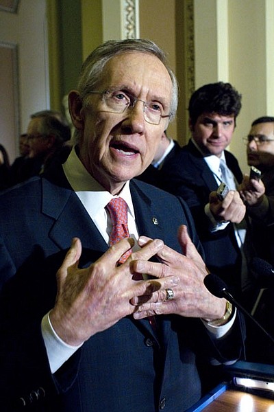 Senate Majority Leader Harry Reid, D-Nev., speaks to reporters after the weekly caucus luncheons on Capitol Hill in Washington, Tuesday, Jan. 25, 2011.(AP Photo/Harry Hamburg)