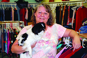 Brian Duggan/Nevada Appeal Beverly Rolfe, owner of B-Thrifty, plans to open her new business on June 1. Also pictured is her dog, Lilly Mae.