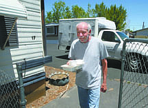 Jim Grant/Nevada AppealMike Stabenchek of Meals on Wheels delivers a meal to a Carson City resident on Tuesday afternoon.